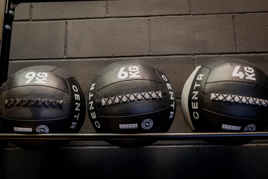 Official HYROX x Centr wall balls (4kg, 6kg, 9kg) at Effortless Gym Poole